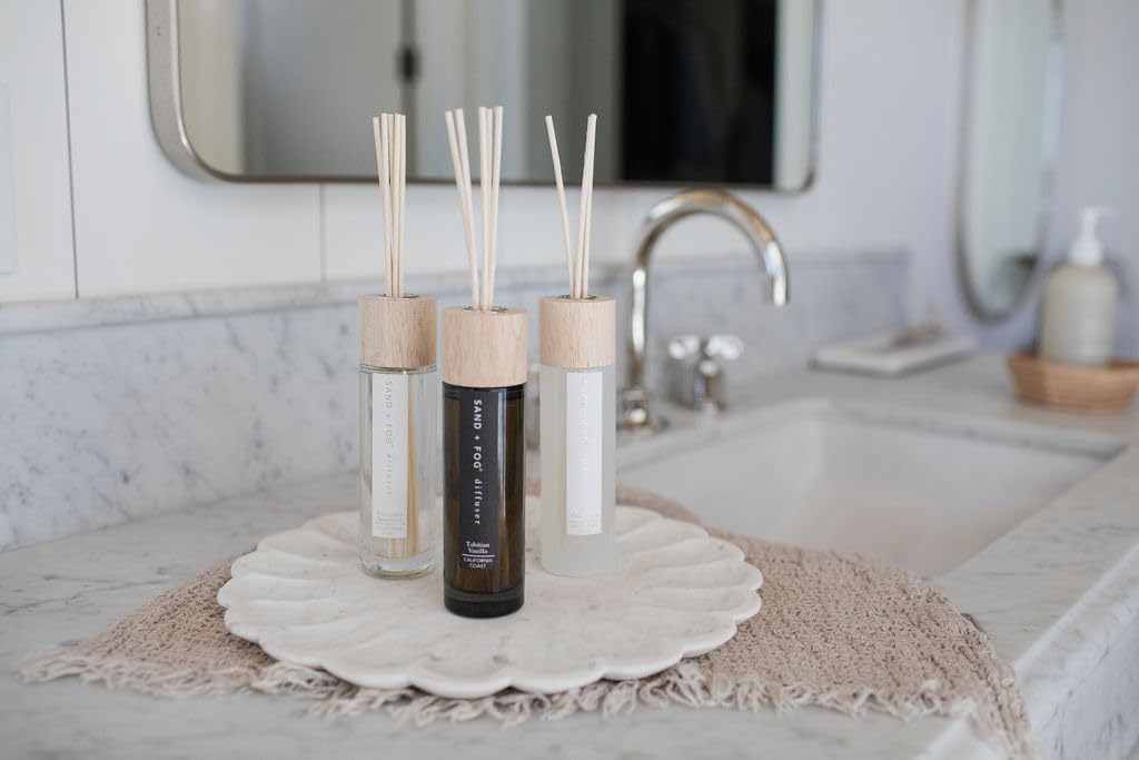Lifestyle shot of Ocean Mist diffuser on a bright table in living room