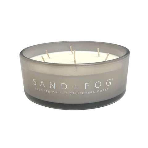 Sand + Fog Vanilla Sandalwood candle close-up showing wicks and glass clarity.