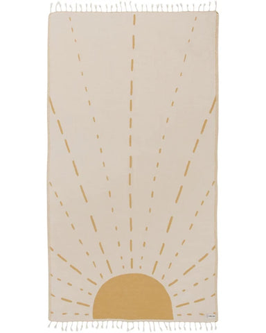 Sand Cloud Sunrise towel on the beach for sun-ready lounging and sand-free comfort