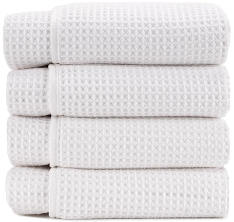 S&T INC. Aura waffle towels folded for compact storage and quick access.