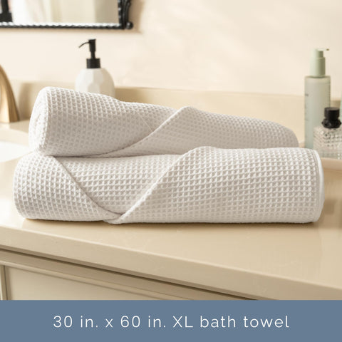 S&T INC. Aura towels beach-ready and sand-free after use.