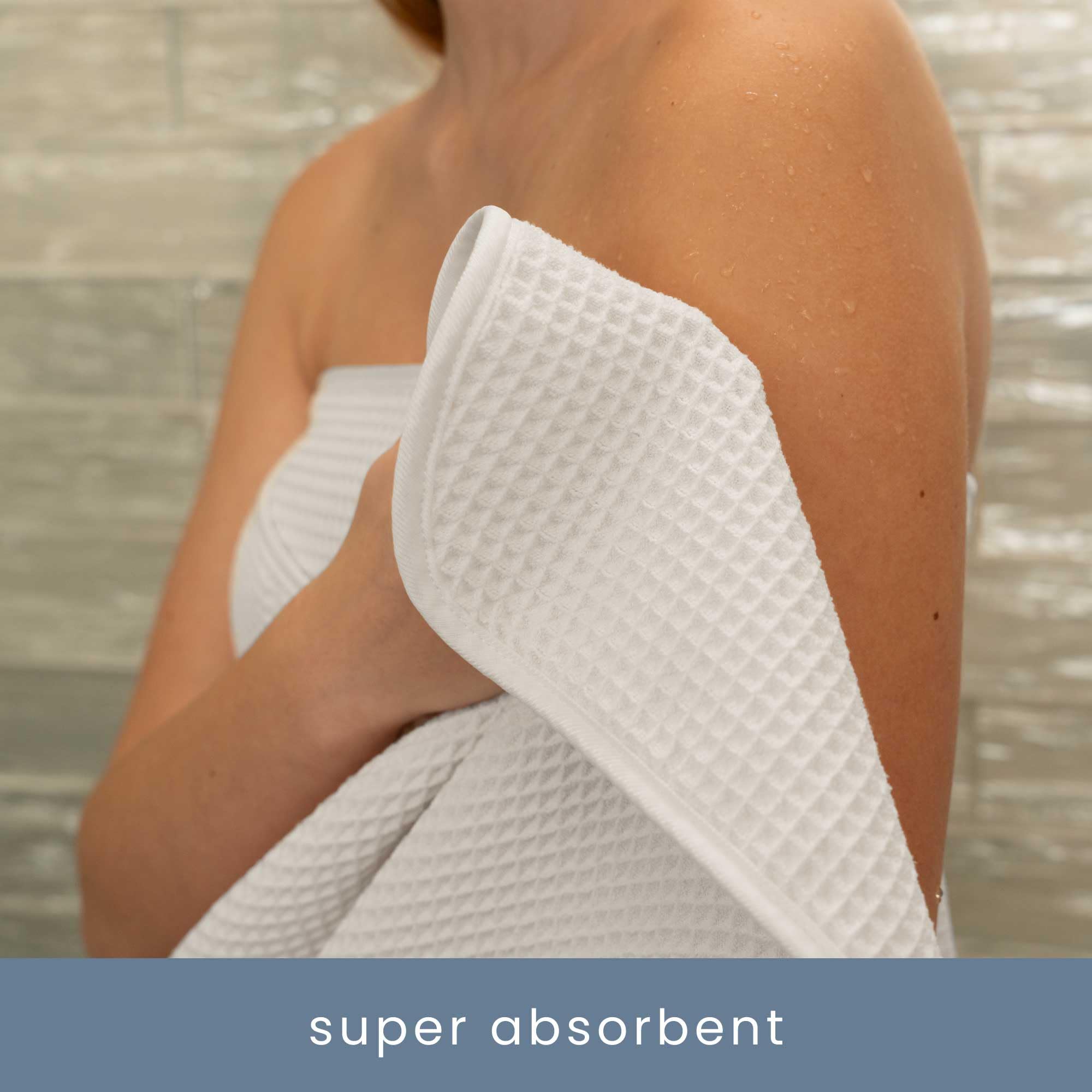 S&T INC. Aura waffle towels with hanging loop for easy air-drying.