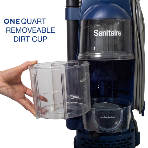 Sanitaire Professional bagless upright vacuum with onboard tools for above-floor cleaning.