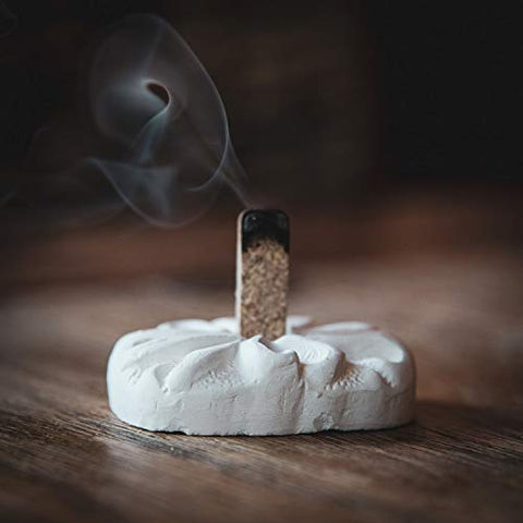 Incienso de Santa Fe Piñon incense bricks closeup highlighting natural wood scent.