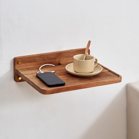 Sarufo gaming console resting on minimalist acacia shelf for organization