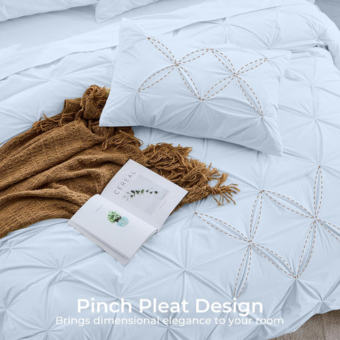 Sasttie Queen Comforter Set flat sheet and pillowcases arranged for a clean bed setup.