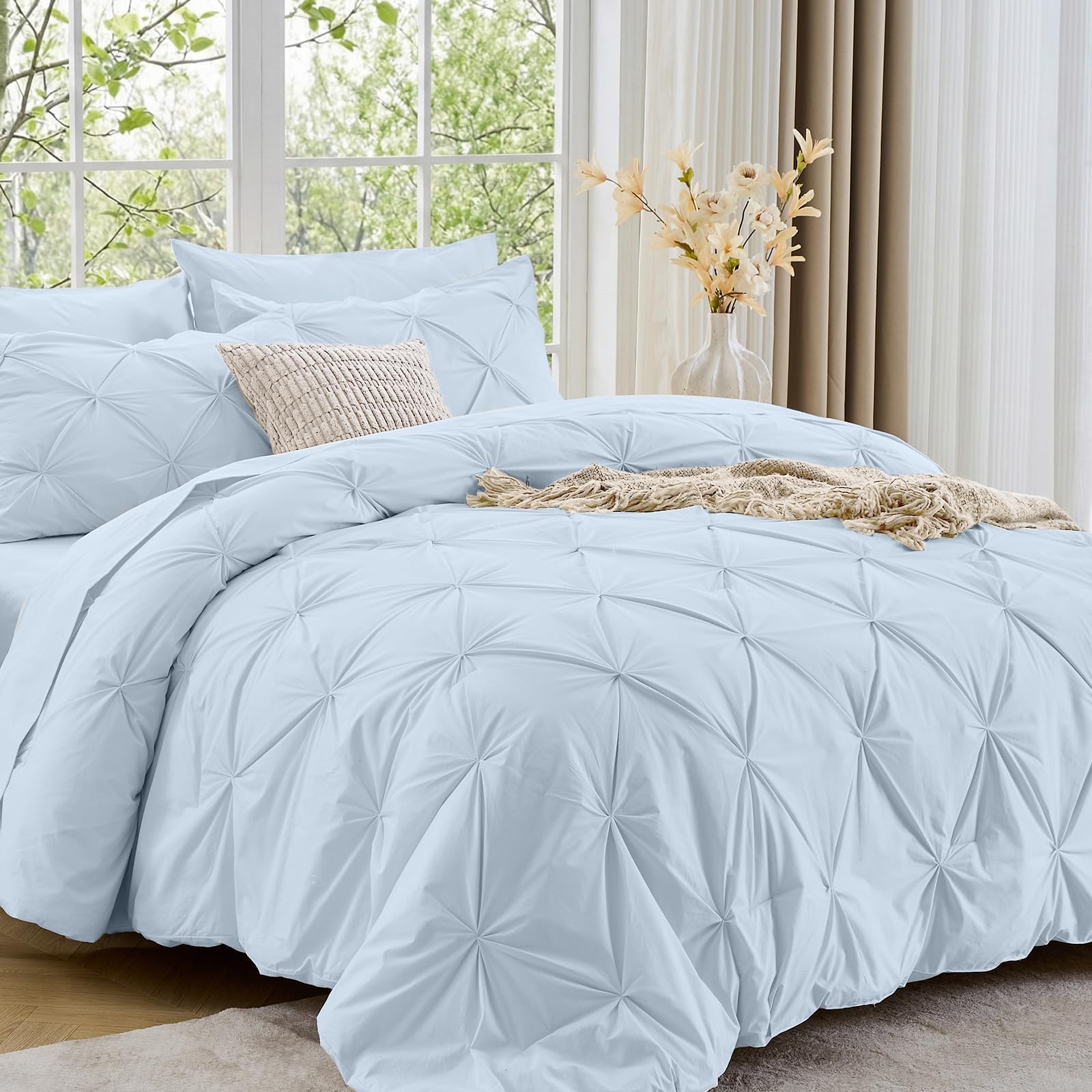 Sasttie Queen Comforter Set pintuck detail adds refined style to your bed.