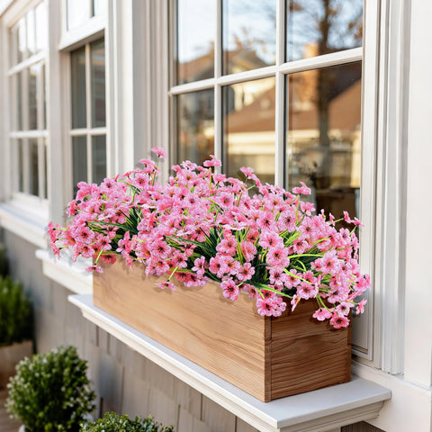 Satefello yard and patio planters with vibrant fake blooms.