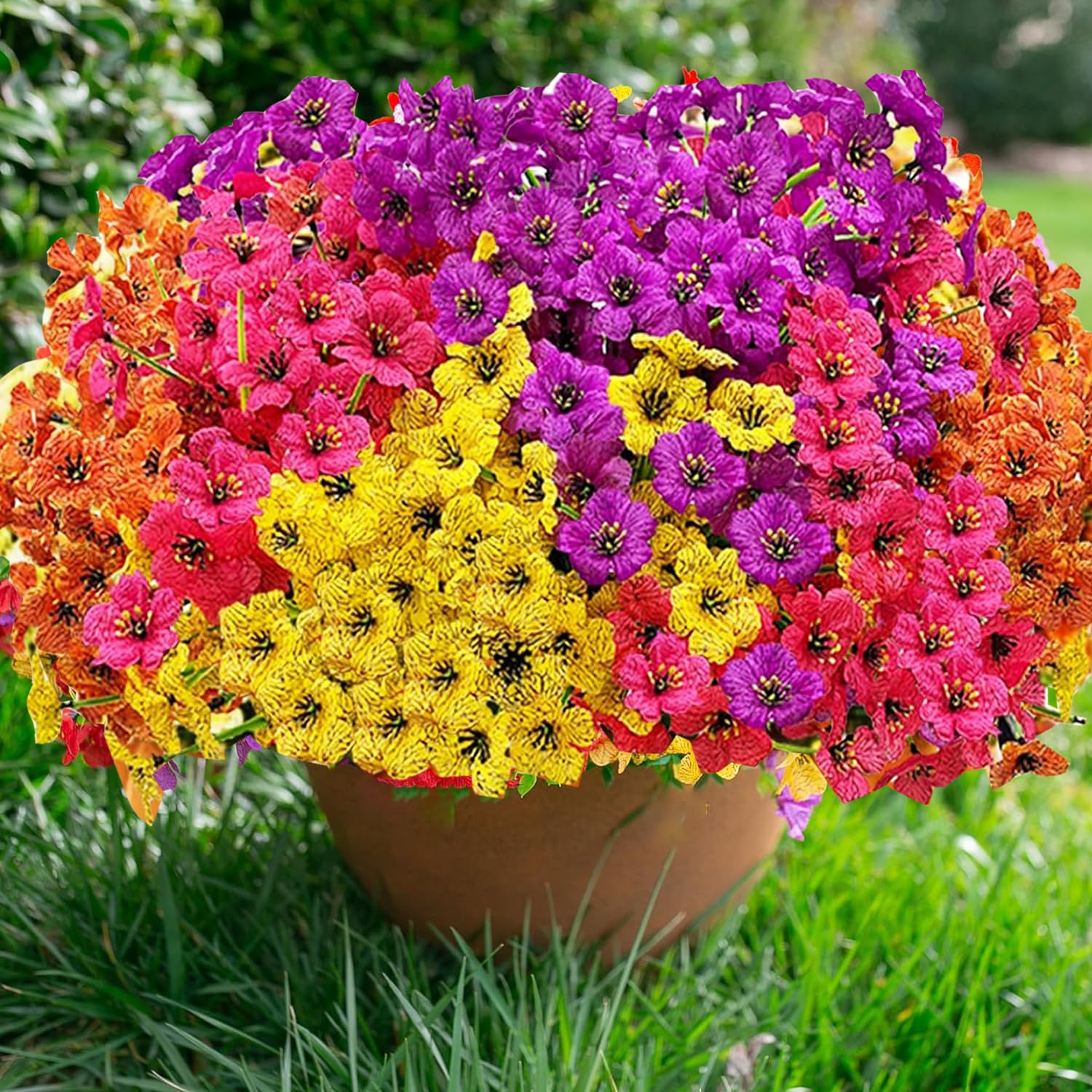 Satefello window box arrangement with vivid faux blooms.
