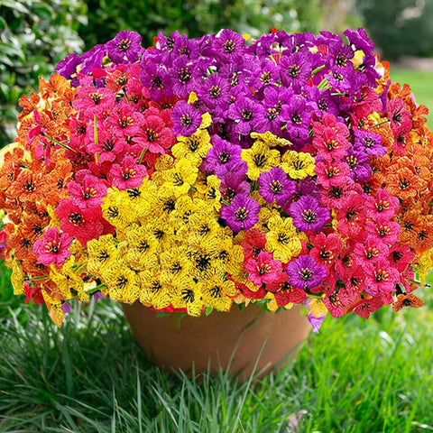 Satefello window box arrangement with vivid faux blooms.