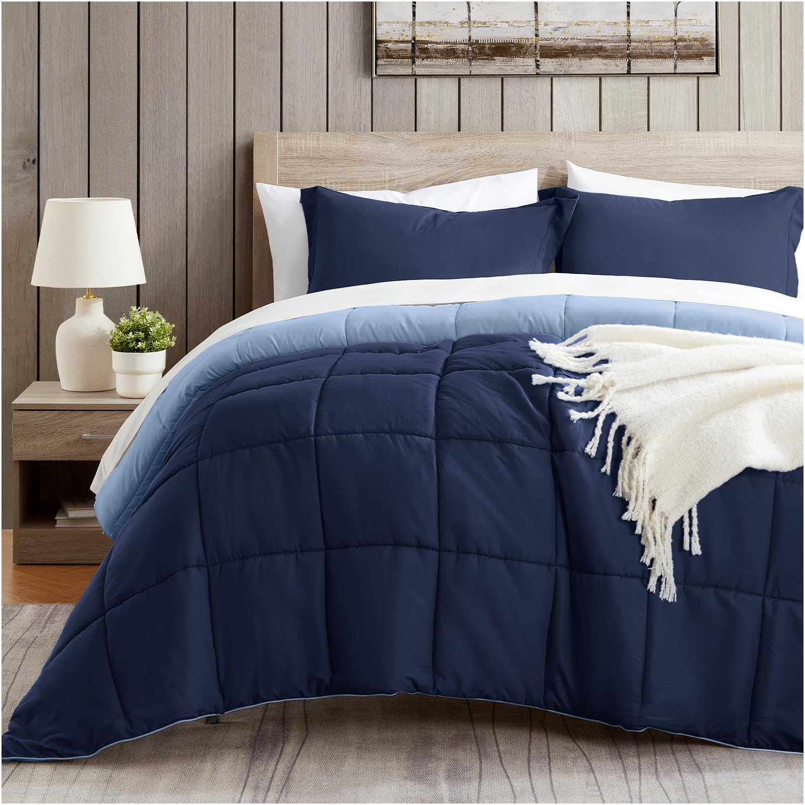 Satisomnia queen comforter set in navy, soft and breathable for year-round comfort.