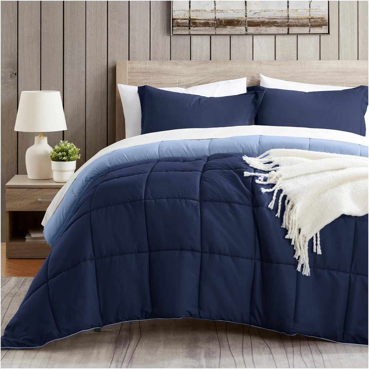 Satisomnia queen comforter set in navy, soft and breathable for year-round comfort.