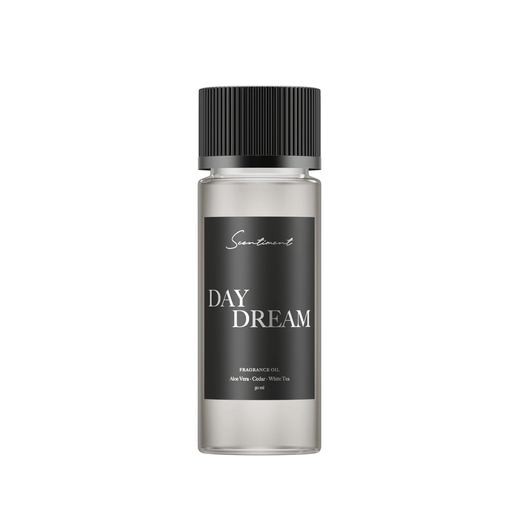 Scentiment Day Dream diffuser oil with aloe vera, cedar, white tea for calming spaces.