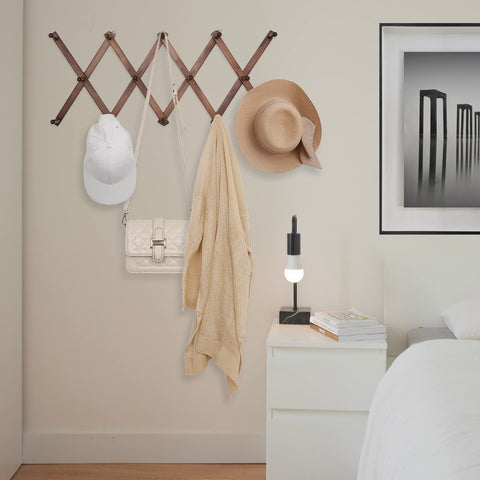 SCUNDA space-saving design helps declutter living room or hallway.