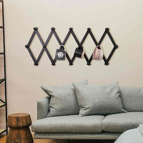 SCUNDA wall-mount coat rack durable construction suitable for high-traffic spaces.