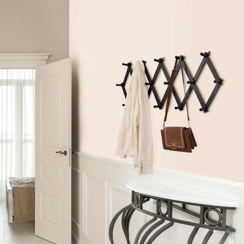SCUNDA wooden coat rack sturdy hook area shows even distribution for heavier items.
