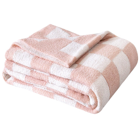 SeaRoomy checkered throw blanket folded in pink, ready for comfy sofa décor.