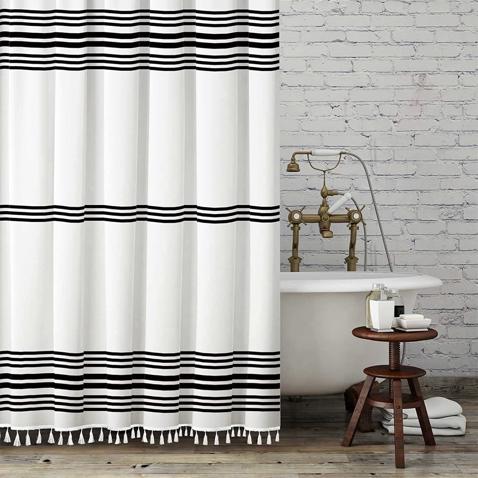 Seasonwood black and white shower curtain tassels brighten the bathroom with stylish boho detail