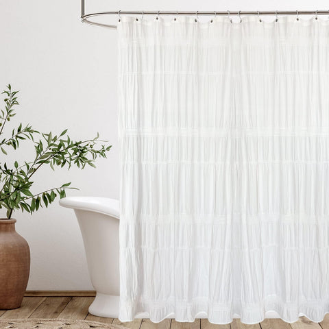 Seasonwood white shower curtain with pinched pleats enhances farmhouse charm.