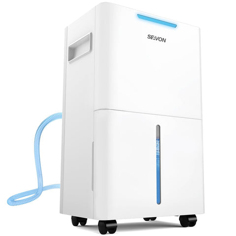 SEAVON 21-pint dehumidifier in basement removing damp air efficiently.