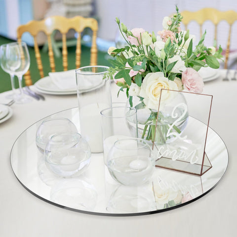Seelenruhe beveled edge round mirror adds safe, elegant sparkle.