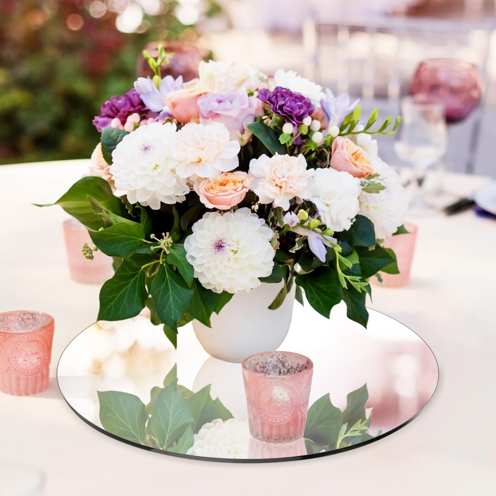 Seelenruhe wedding table setup using large 12in mirrors for reflections.