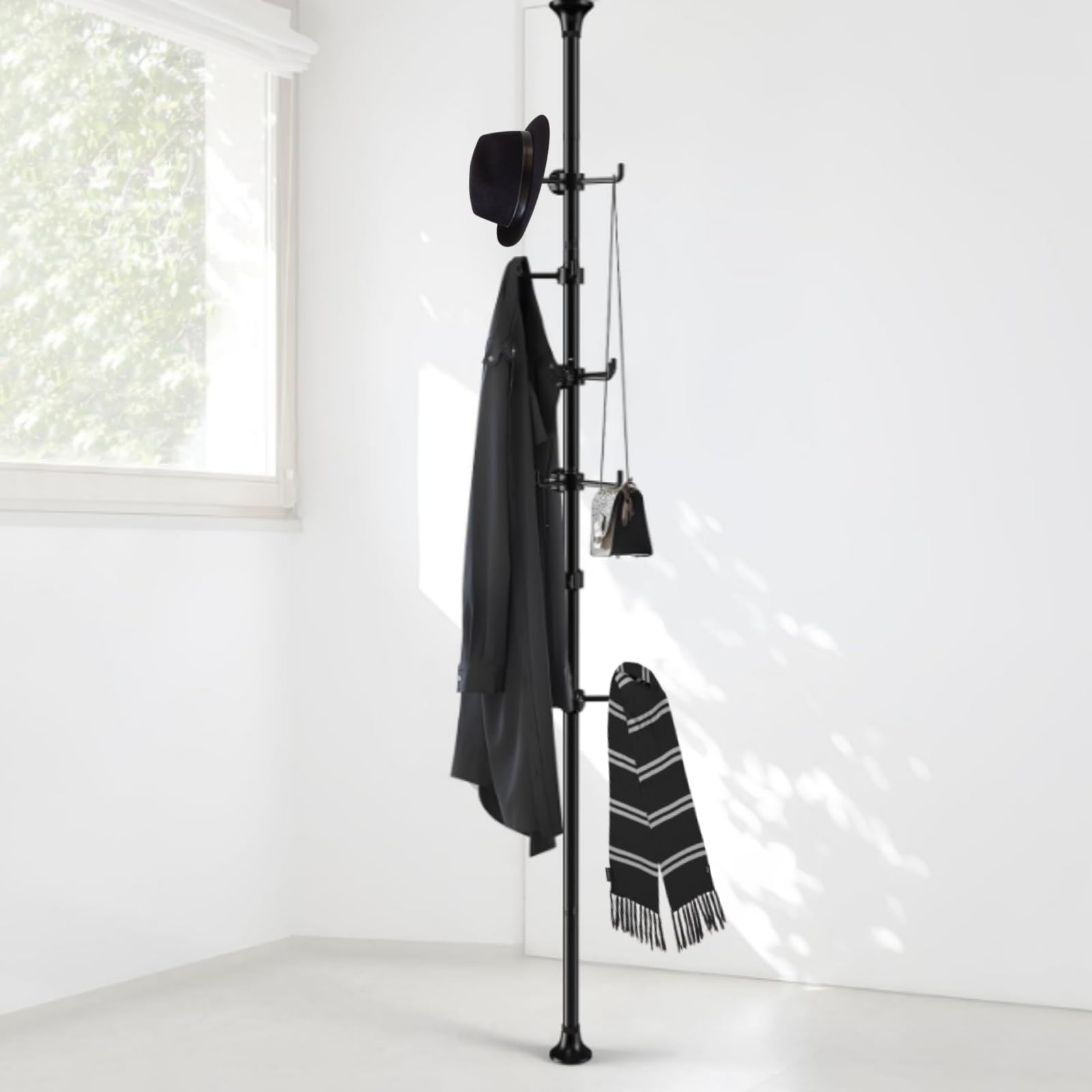 Sempicad Coat Rack holds coats, hats, plants and more.