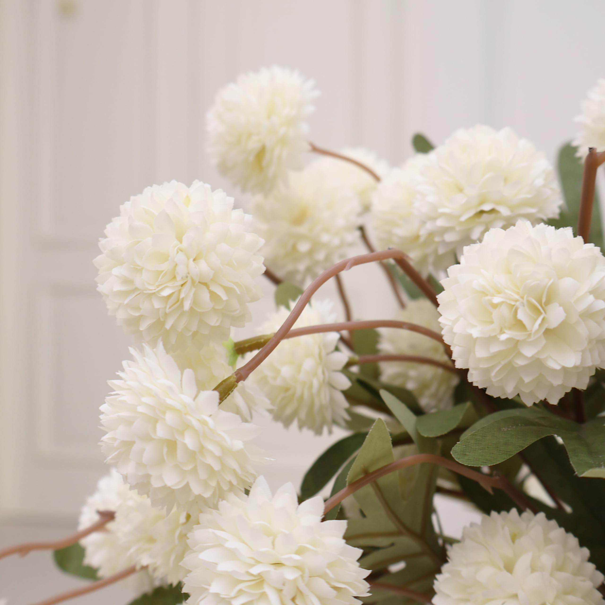 Senjie wedding centerpieces ideas using durable faux chrysanthemums.