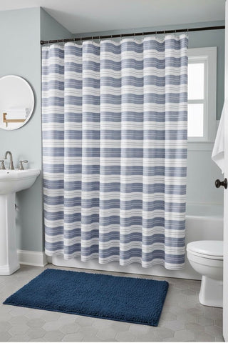 Serafina Home blue and white stripe design suits boys' bathrooms with clean, classic vibe