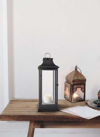 Serene Spaces Living lantern placed indoors or outdoors elevates porch decor.