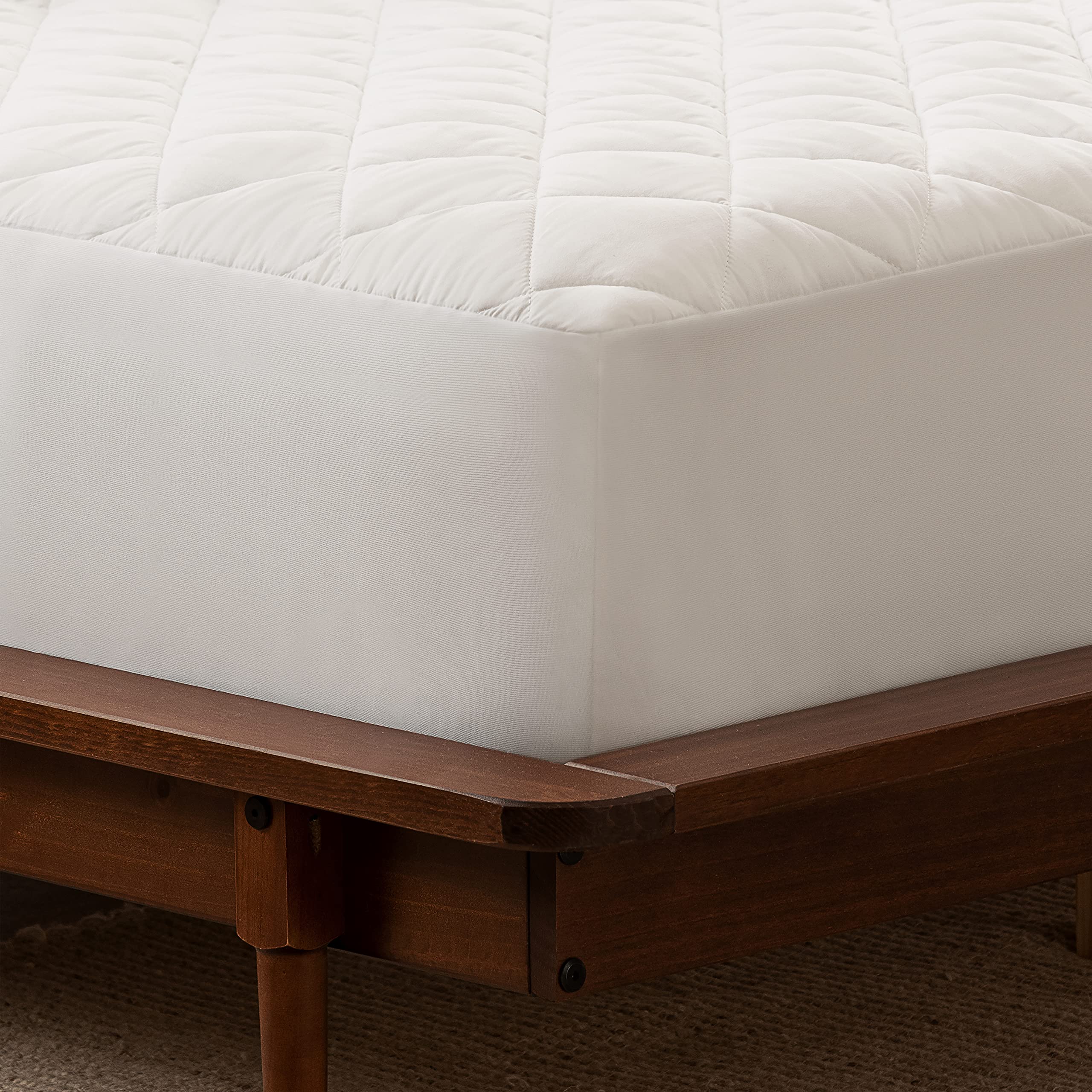 Serta Power Clean waterproof mattress pad with side skirt for secure fit