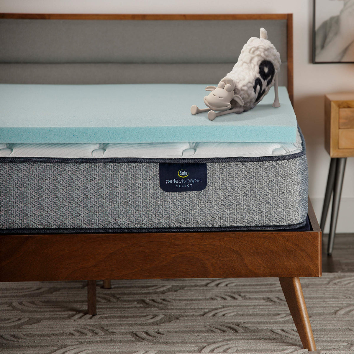 Serta ThermaGel cooling topper unrolled on bed for cooler sleep