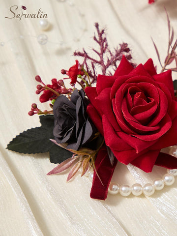 Serwalin red-black color contrast on corsage and boutonniere adds visual impact.