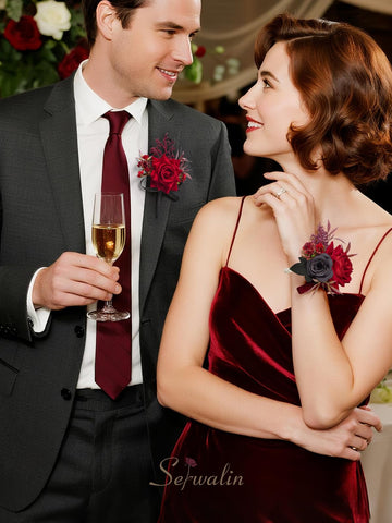 Serwalin red boutonniere with matching foliage complements coordinated formal wear.