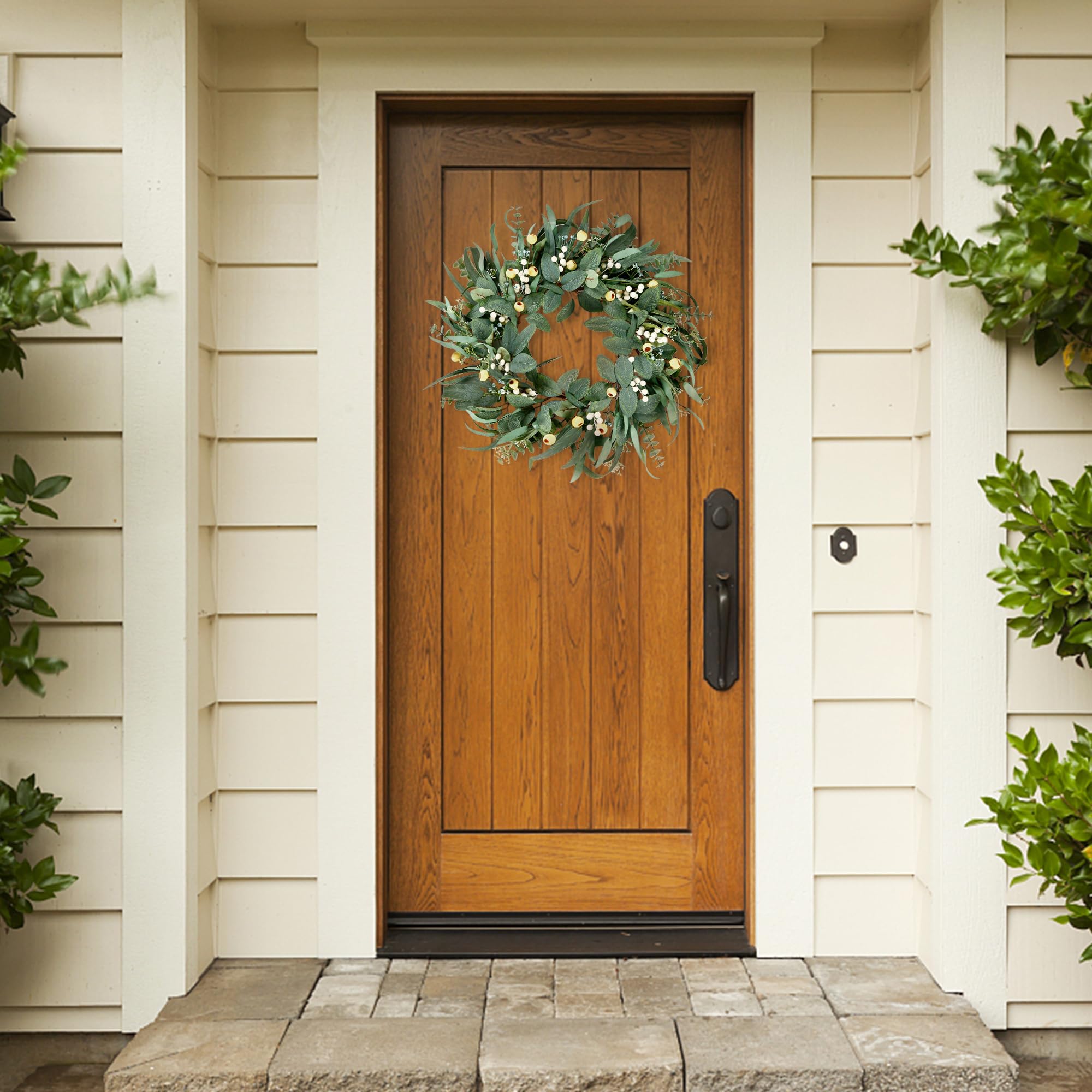 Sggvecsy artificial wreath on front door display adds welcoming curb appeal.
