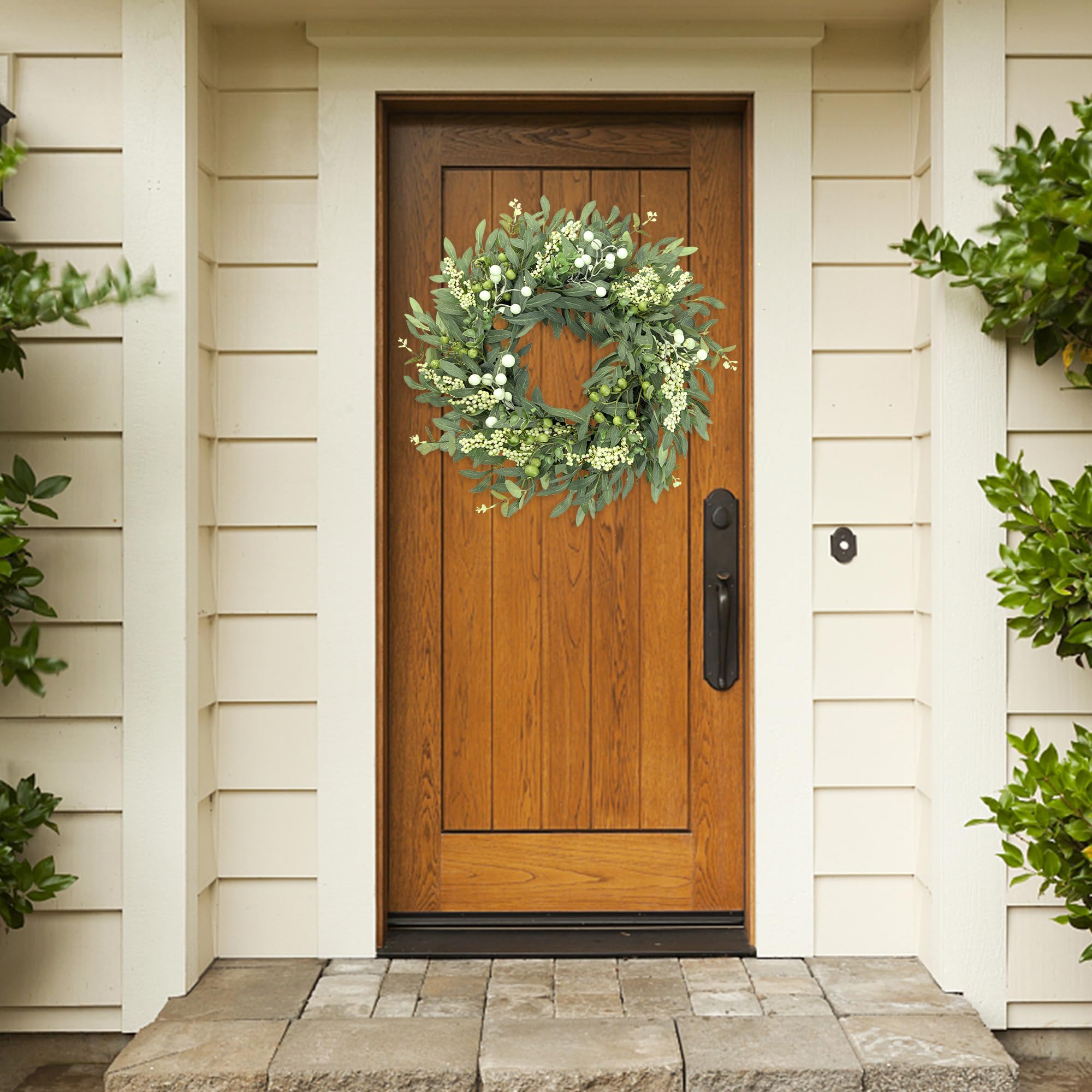 Sggvecsy wreath displayed indoors or outdoors under cover