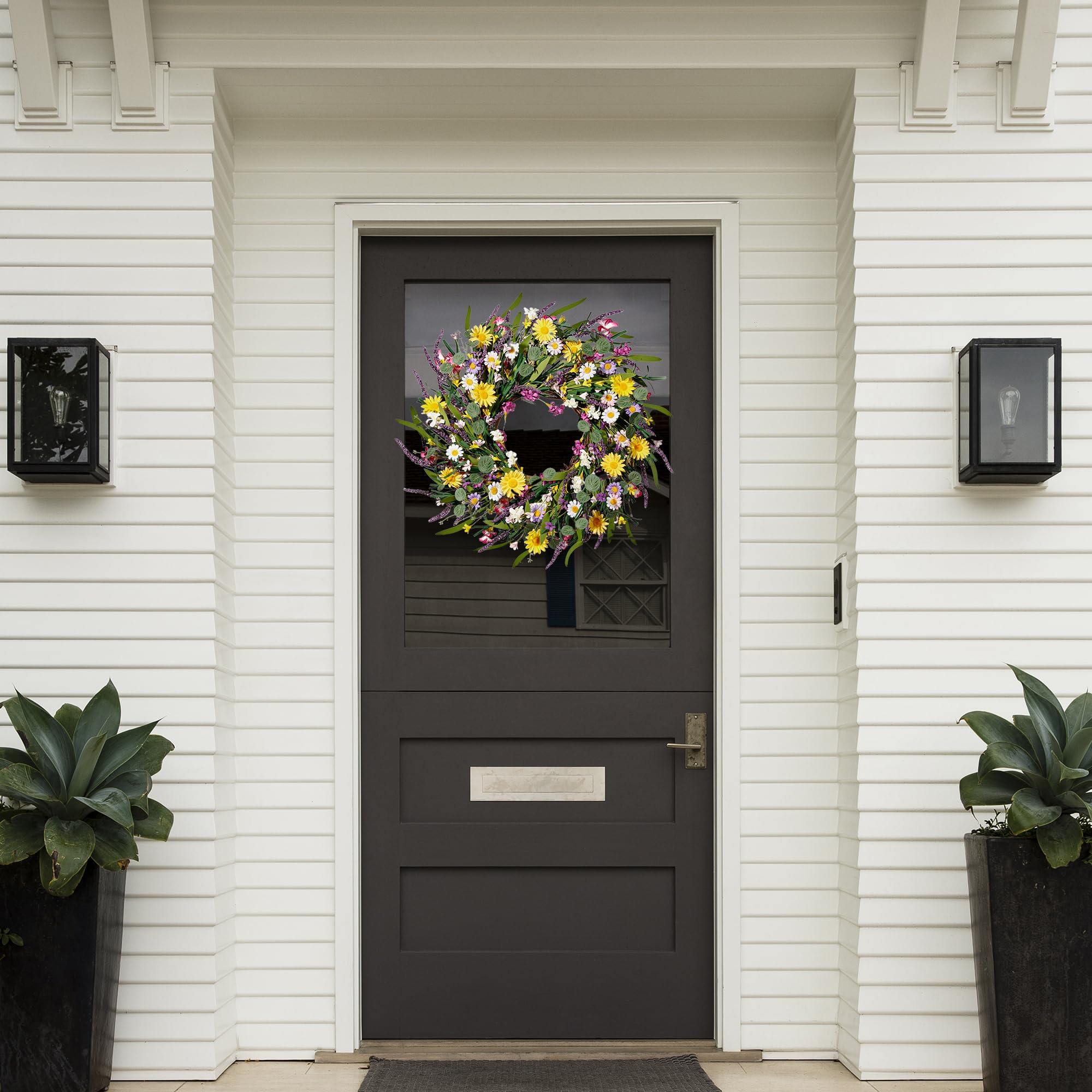 Sggvecsy wreath over fireplace mantel adds cozy seasonal charm.