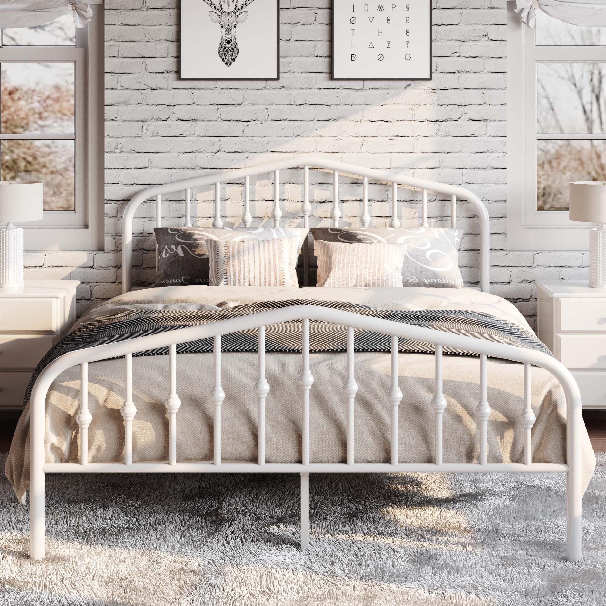 SHA CERLIN headboard detail highlighting ornate wrought iron design.