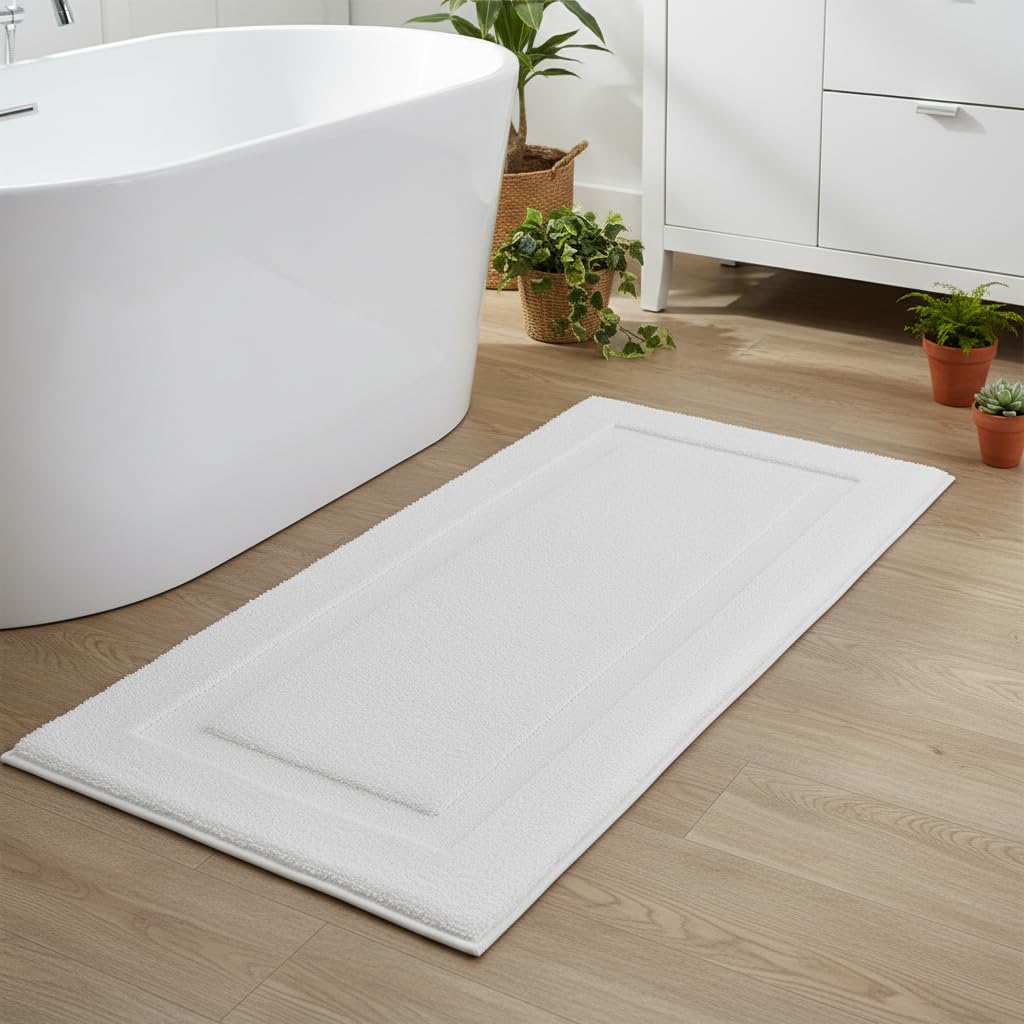 SHACOS white bath mat enhances clean look in any space.