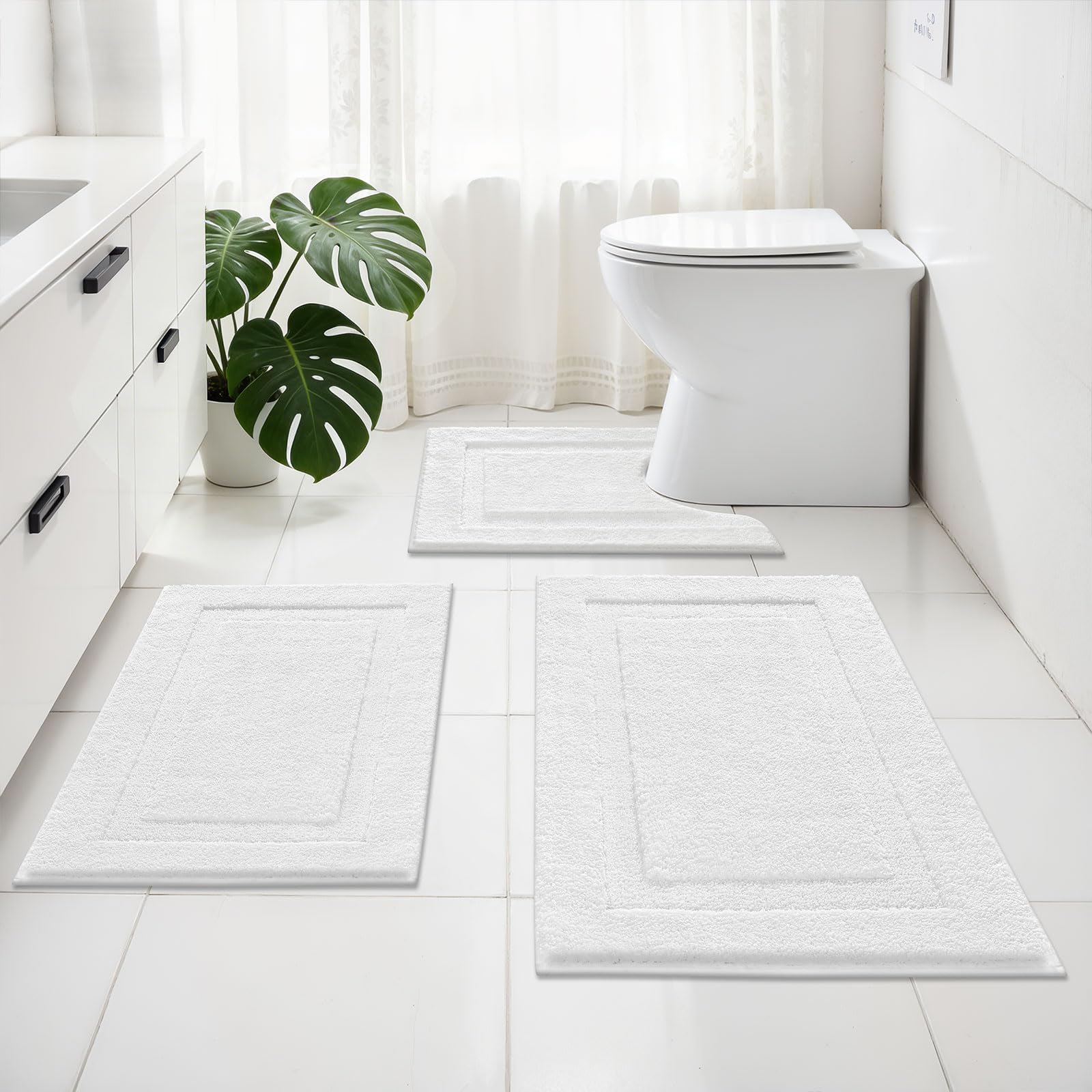 SHACOS white U-shaped toilet rug designed to fit around the toilet for a neat finish.