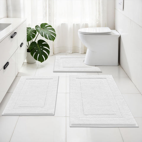 SHACOS white U-shaped toilet rug designed to fit around the toilet for a neat finish.