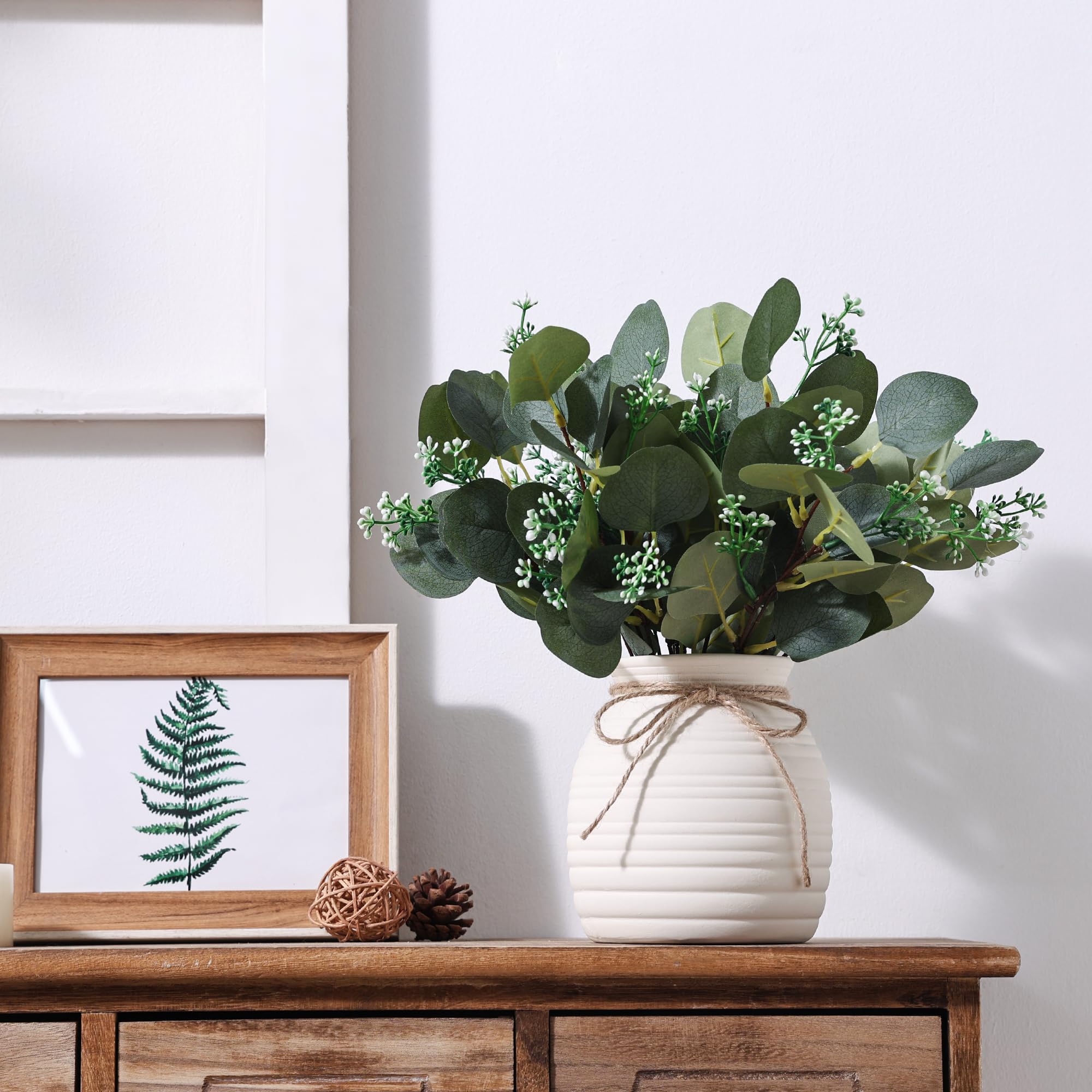 Shanranplus sage green eucalyptus adds elegant mantel decor.