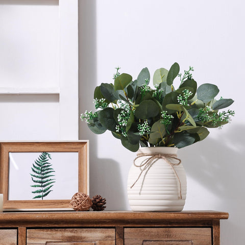 Shanranplus sage green eucalyptus adds elegant mantel decor.