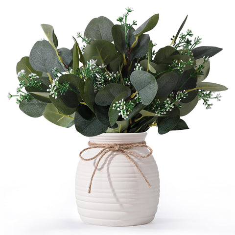 Shanranplus artificial eucalyptus in ceramic vase enhances cozy living rooms.