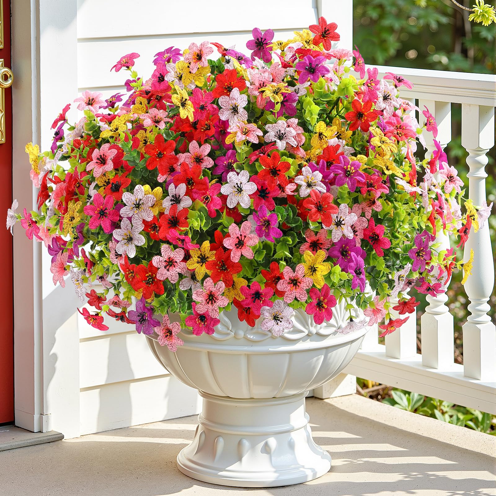 SHareconn rose and pink bellflowers brighten garden borders.