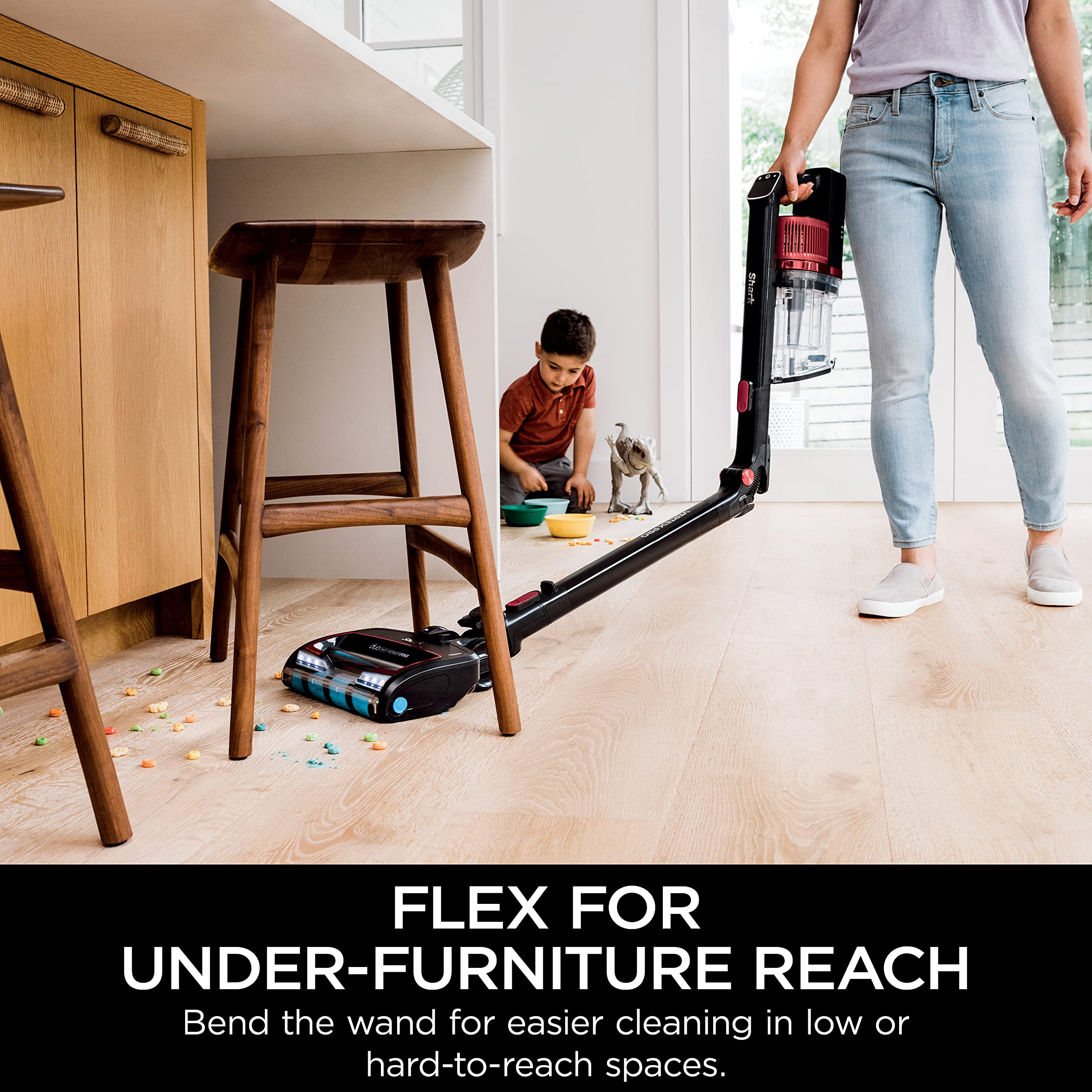 Shark Vertex Pro LED headlights illuminate debris under furniture.