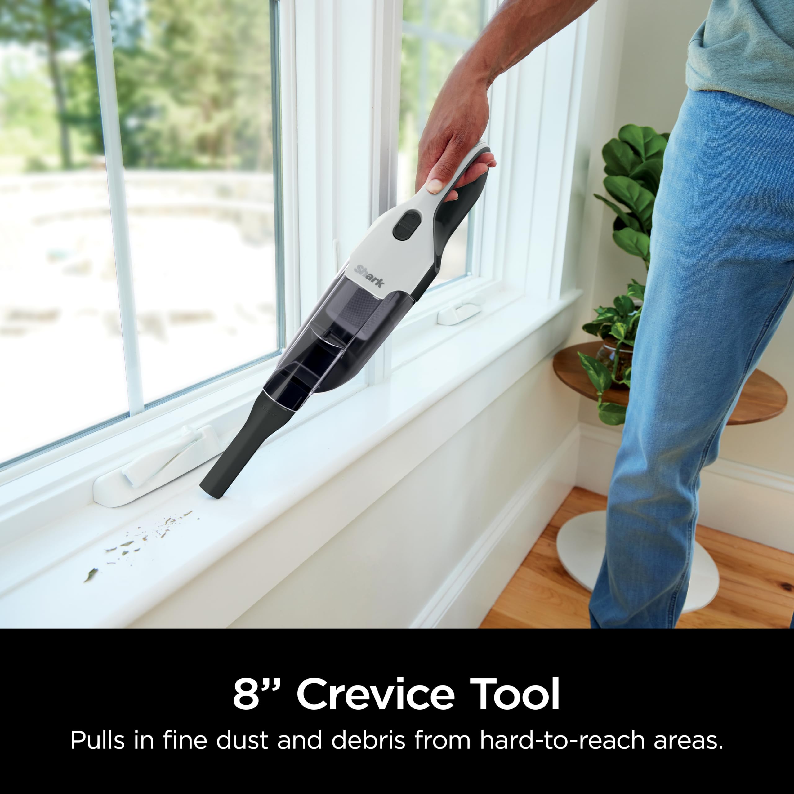 Shark Cyclone PET upholstery-tool attachment lifting pet fur from sofa.