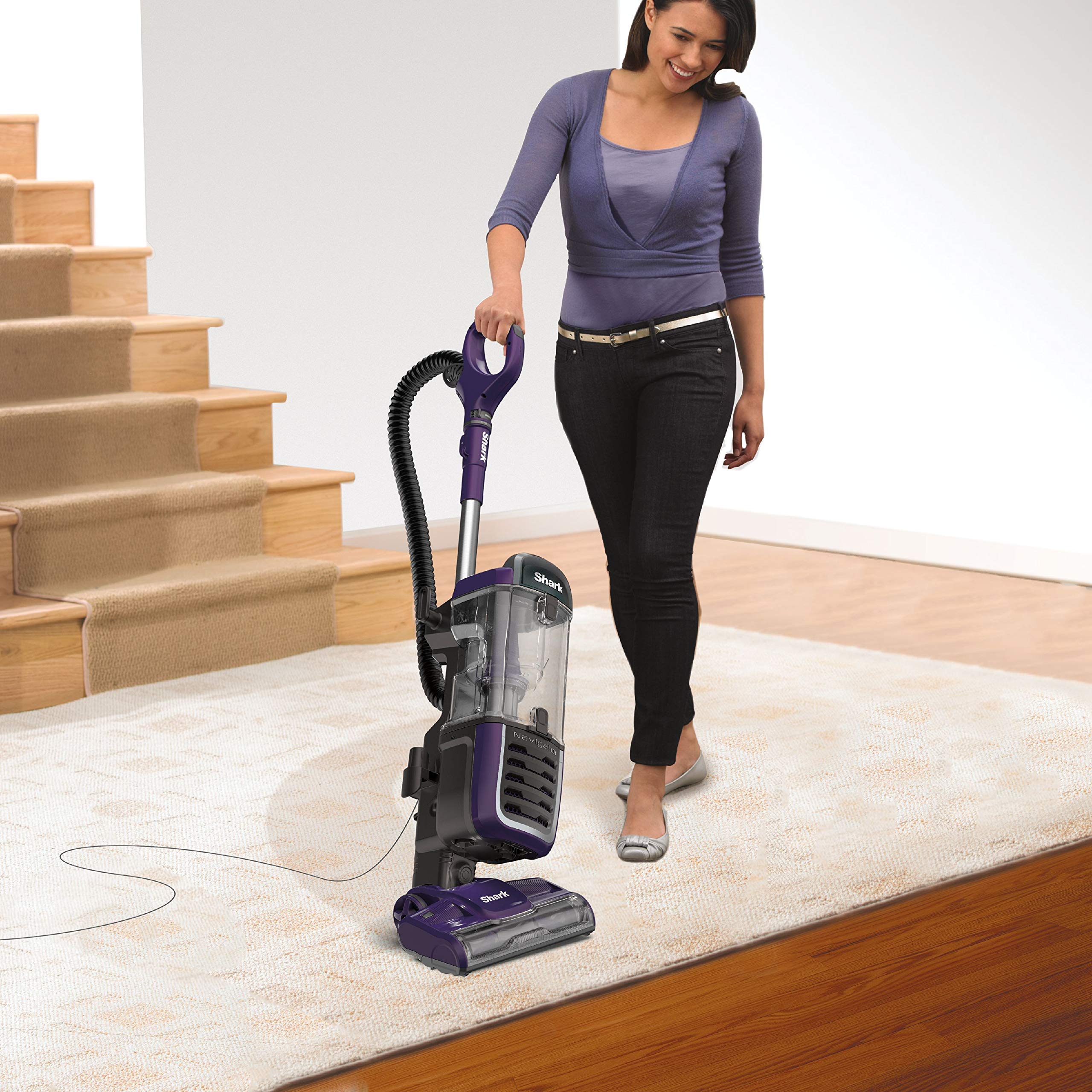 Shark Navigator Swivel Pro lift-away canister detaches for above-floor cleaning.