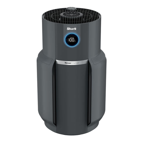 Shark NeverChange Max purifier in living room demonstrates large-room air purification.
