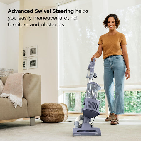 Wide upholstery tool removing pet hair from furniture